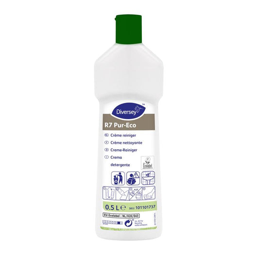 Eine weiße 500 ml Flasche Diversey R7 Pur-Eco Creme-Reiniger von Diversey Deutschland GmbH & Co. OHG mit grünem Verschluss, mehrsprachig beschriftet und umweltfreundlich für harte, wasserfeste Oberflächen.