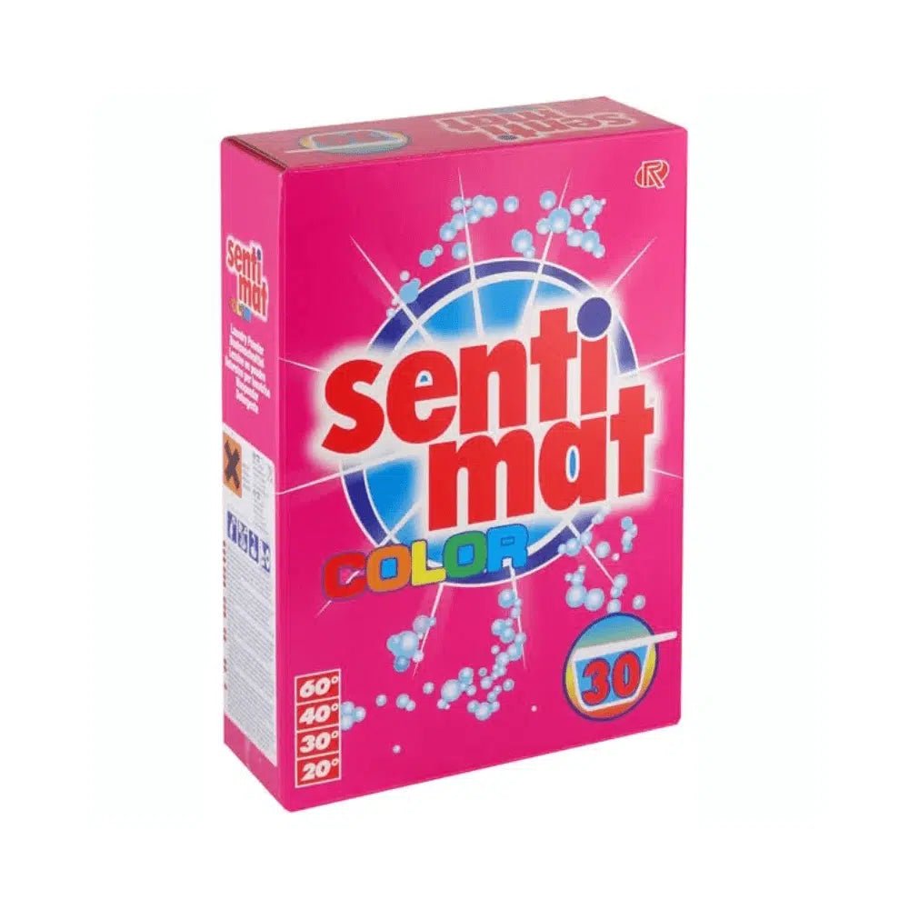 Une boîte rose Rösch Lessive pour linge de couleur Sentimat de Rösch Germany GmbH présente un design bleu et blanc orné de motifs moléculaires. Elle met en avant ses propriétés détachantes et convient à un lavage à 60, 40, 30 et 20 degrés, le chiffre 30 étant clairement visible à l'intérieur d'un cercle.