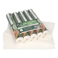 Fünf Packungen PAPSTAR Butterbrotpapier mit je 500 weißen Blättern im Format 25x30 cm sind auf ungefalteten Blättern gestapelt. Die grünen Verpackungen der PAPSTAR GmbH sind mit Lebensmittelbildern und -details versehen und eignen sich daher ideal für die vielseitige Aufbewahrung von Lebensmitteln.