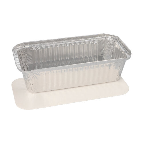 Une poêle Starpak 25, Alu + couvercle intérieur, revêtue de PP repose sur du papier parchemin blanc - parfaite pour le catering ou à emporter.
