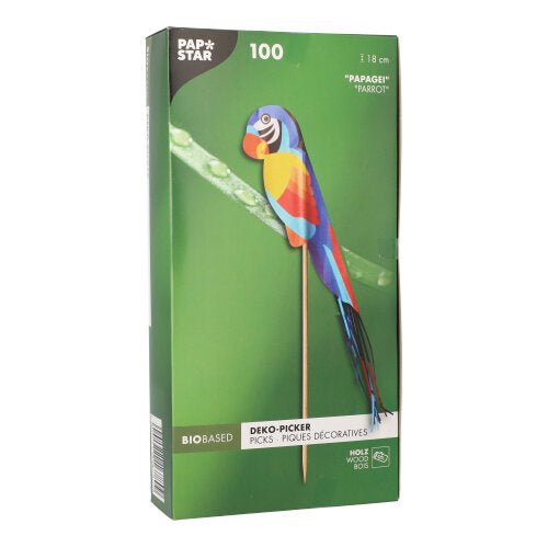 Die grüne Box der PAPSTAR 100 Deko-Picker der PAPSTAR GmbH enthält 100 Holzpicker mit bunten Papierpapageien – ideal für stilvolle Präsentationen. Die Verpackung enthält Produktinformationen und Bilder in mehreren Sprachen.