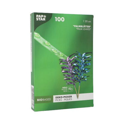 Der PAPSTAR 100 Deko-Picker der PAPSTAR GmbH ist eine grüne Box mit 100 biobasierten Palmblatt-Picks, jeweils 20 cm lang. Die Verpackung zeigt ein Bild und Fotos der Picks in Blau und Lila – ideal für Buffets und elegante Präsentationen.
