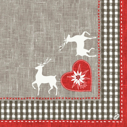 Un motif en tissu avec deux cerfs blancs, un cœur rouge avec une fleur et une bordure en vichy brun-blanc - un motif au look lin, parfait pour les serviettes Dunisoft 40 x 40 cm 1/4 pli de Duni GmbH.