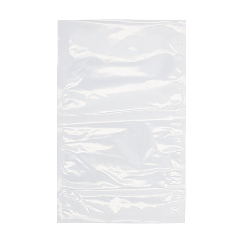 Un sachet à souder Starpak 100 transparent (PA/PE), posé à plat sur un fond blanc - idéal comme sachet sous vide refermable pour aliments ou à utiliser avec une machine à vide à cloche.