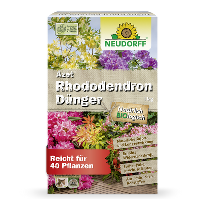 Une boîte rectangulaire de 1 kg d'engrais Azet Rhododendron de Neudorff Shop est ornée de fleurs en fleurs, d'informations sur le produit en allemand et d'un logo Neudorff vert et jaune, ce qui la rend idéale pour les rhododendrons et les azalées.