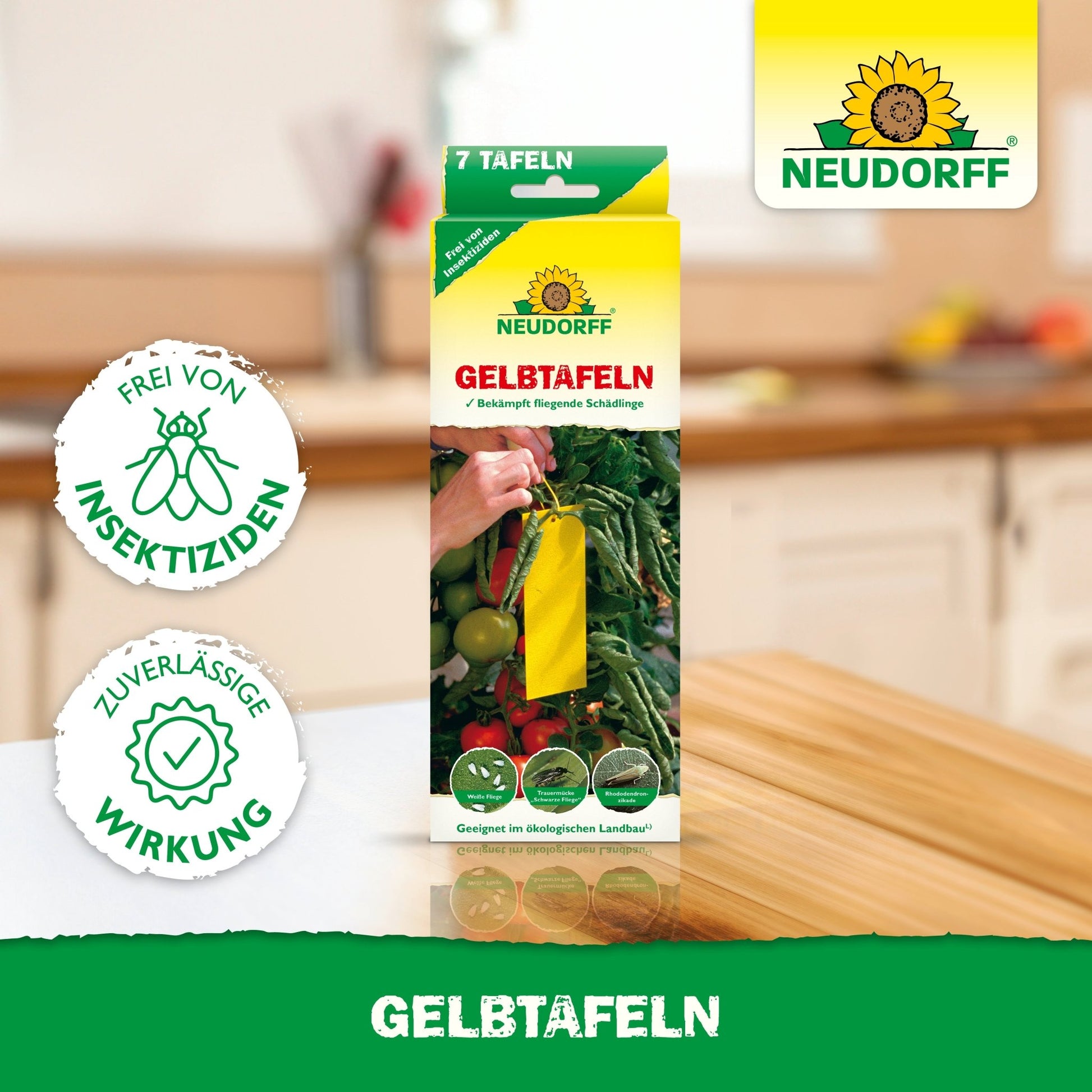 Sur une table de cuisine se trouve une boîte de Neudorff Shop Plaques Jaunes (format réduit) avec des pièges collants jaunes pour les plantes et la mention "sans insecticides" avec une efficacité fiable contre les nuisibles comme les mouches blanches.