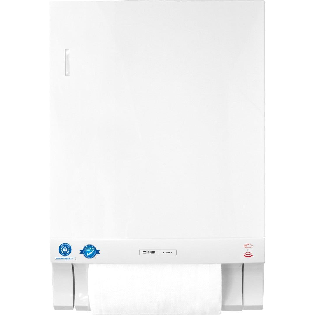Le distributeur de serviettes en tissu CWS ParadiseLine Dry Slim Non-Touch, y compris le panneau blanc, est un distributeur mural blanc qui offre une distribution hygiénique et sans contact des serviettes ; un rouleau est partiellement distribué au fond.
