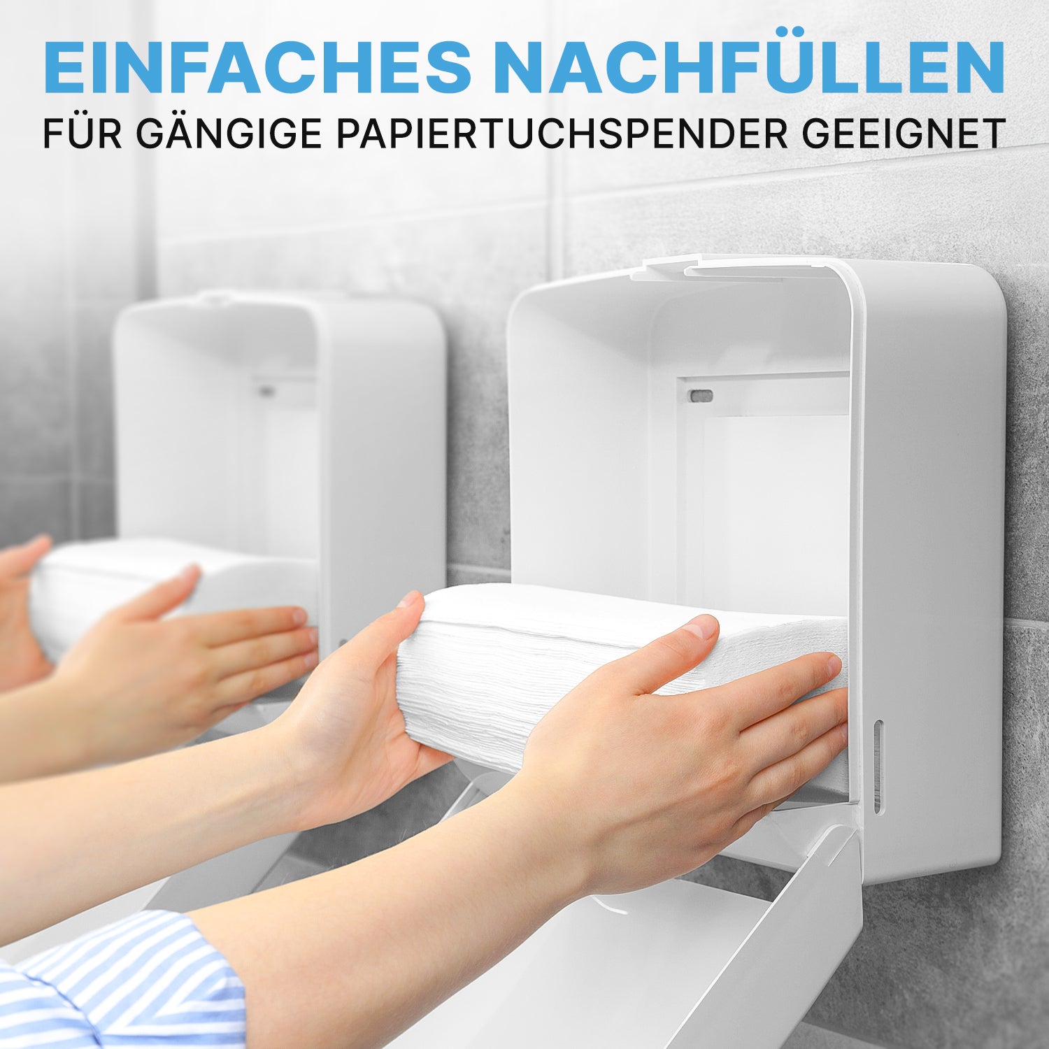Eine Person füllt einen weißen Spender mit ARNOMED PAPIERHANDTÜCHER 25 x 23 cm | V-FALZ der ARNOWA GmbH in einem modernen Waschraum nach. Im deutschen Text heißt es, dass sie leicht nachzufüllen sind und in Standardspender passen.