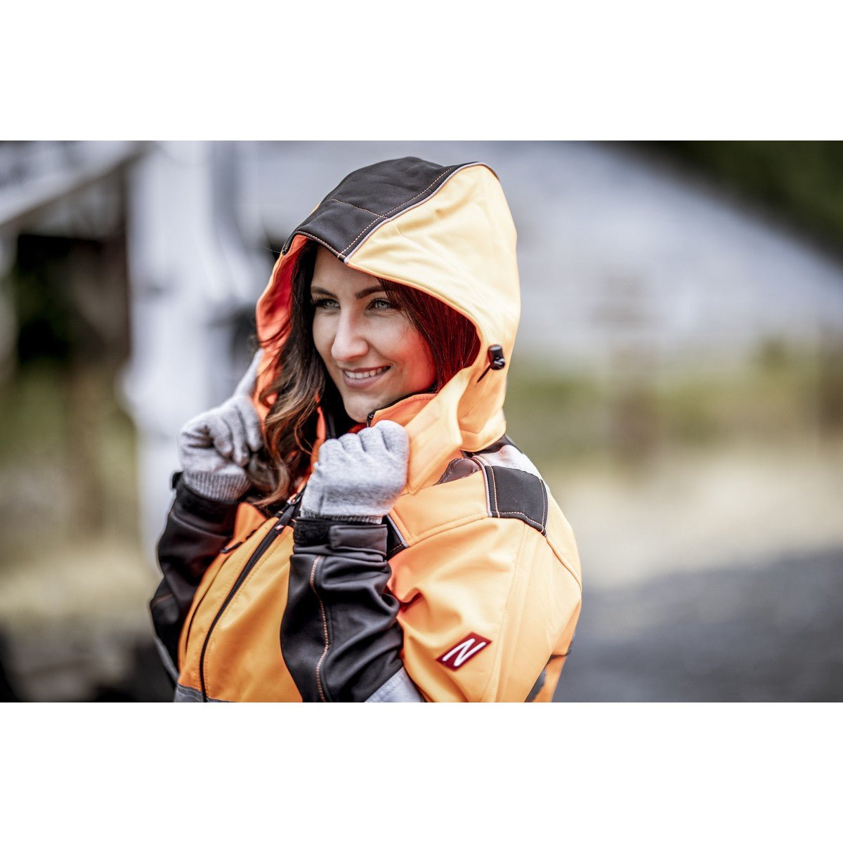 Capuche amovible NITRAS, orange fluo/noir, polyester OEKO-TEX : 100% | Paquet (1 pièce)