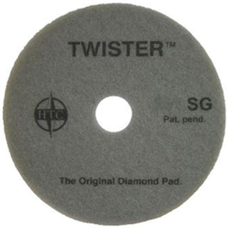 Le Twister Pad 10000 de Diversey Deutschland GmbH & Co. OHG est un pad rond et gris avec les inscriptions "TWISTER SG", "HTC", "Pat. pend." et "The Original Diamond Pad" - idéal pour nettoyer et polir les sols durs pour une brillance éclatante.