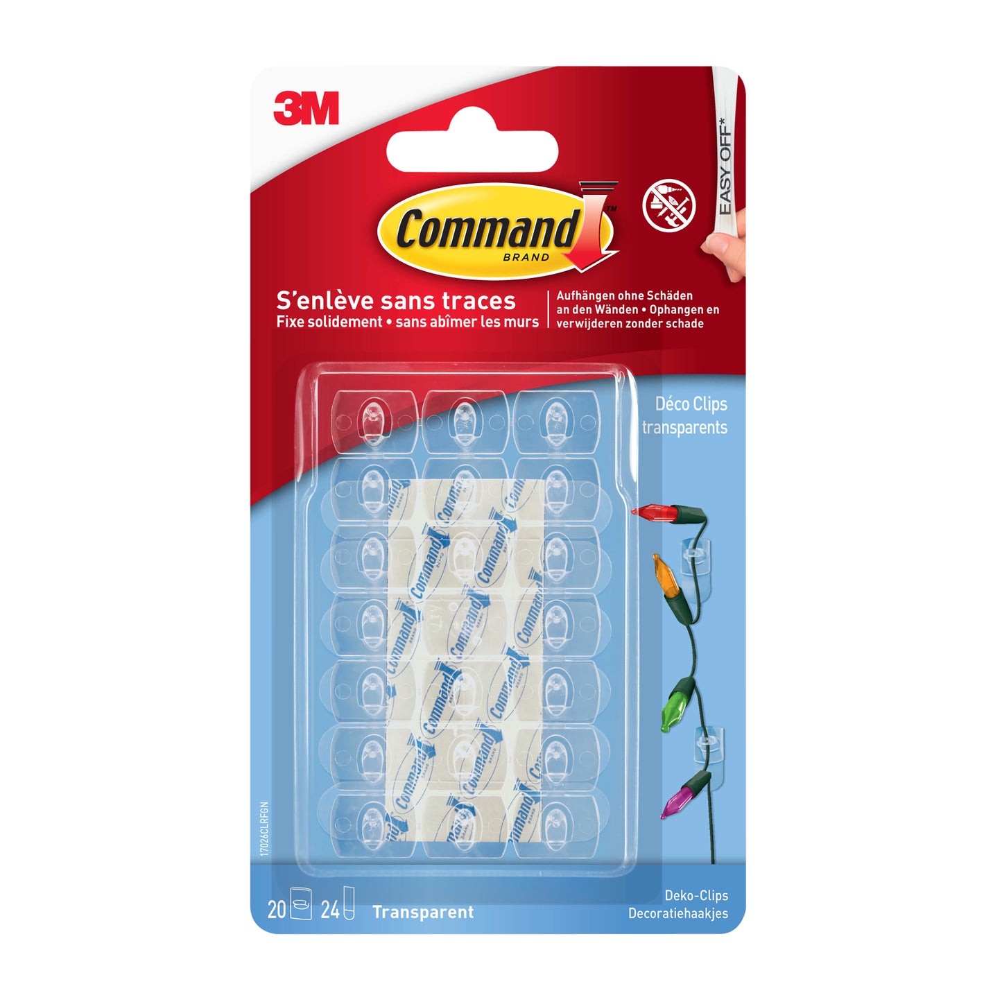 Eine Packung Command™ Dekorations-Clips der 3M Deutschland GmbH, transparent mit klaren Streifen, enthält 20 Clips und 24 Klebestreifen in einer klaren Verpackung mit rotem und blauem Branding.