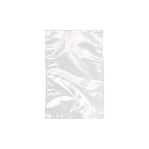 Un sachet à souder Starpak 100, PA/PE transparent de Starpak est vide et clairement représenté devant un fond blanc. Le sac en plastique rectangulaire, souvent utilisé avec des machines à vide à cloche, apparaît plat et légèrement froissé.