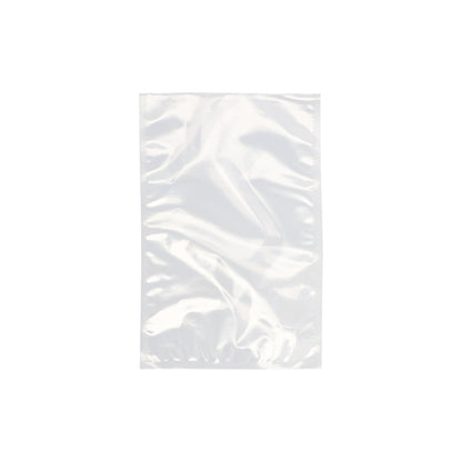 Un sachet à souder Starpak 100, PA/PE transparent de Starpak est vide et clairement représenté devant un fond blanc. Le sac en plastique rectangulaire, souvent utilisé avec des machines à vide à cloche, apparaît plat et légèrement froissé.