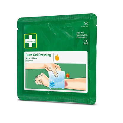 Eine grüne Packung Cederroth Verbrennungsgel verband 10x10 cm, 2er-Pack (2 Stück) von Orkla Wound Care AB zeigt eine Hand, die das Pad auf eine Armverbrennung aufträgt, mit Feuer- und Eissymbolen für die Erste Hilfe bei Verbrennungen.