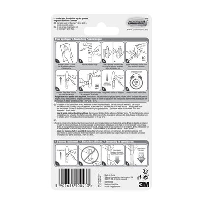 Arrière de l'emballage des crochets en métal Command™ "classique" (3M Deutschland GmbH) avec un guide illustré étape par étape en plusieurs langues pour une utilisation et un retrait corrects, ainsi que des avertissements et des informations sur le produit en bas.
