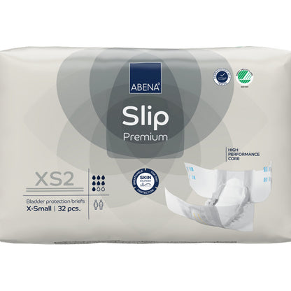 Eine 32er-Packung ABENA Slip Premium von Abena Re-Seller GmbH in der Größe XS2 X-Small in beiger Verpackung mit den Zertifizierungen "High Performance Core" und "Skin Friendly" für eine zuverlässige Inkontinenzversorgung.