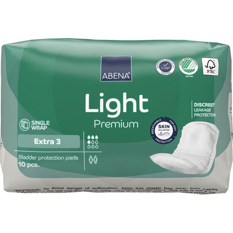 Eine grün-weiße Packung ABENA Light Extra 3, Premium von Abena Re-Seller GmbH, enthält 10 Stück Blasenschutzeinlagen. Die Verpackung zeigt die Eigenschaften und ein Bild der Einlage auf der rechten Seite für den täglichen Komfort.