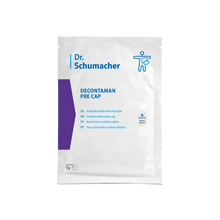 Die Dr. Schumacher Decontaman Pre Cap Waschhaube | Packung (1 Haube) von Dr. Schumacher GmbH kommt in einer weißen Packung mit blau/violetter Schrift und mehrsprachigen Infos - perfekt für die antimikrobielle Reinigung mit der DECONTAMAN CAP Waschhaube.