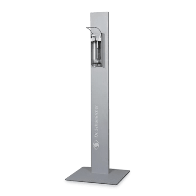 Der Dr. Schumacher Desipoint | Stück (1 Stück) der Dr. Schumacher GmbH ist ein hoher, rechteckiger Handdesinfektionsmittelspender mit Metallic-Finish auf einem flachen, quadratischen Sockel, ideal für hygienische Desinfektionsmittel und Oberflächenreinigung auf einem schlichten weißen Untergrund.