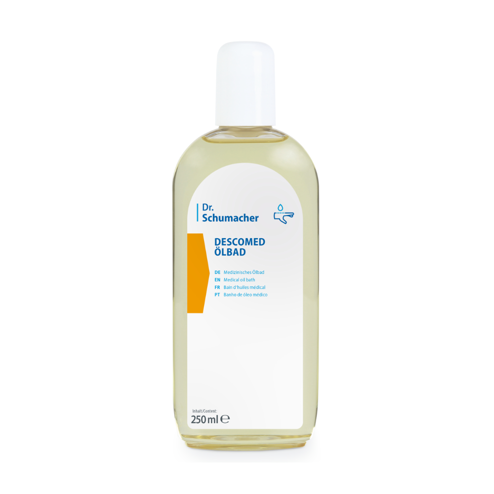 Une bouteille en plastique transparent avec un bouchon blanc contient le bain d'huile Descomed de Dr. Schumacher | Bouteille (250 ml) de Dr. Schumacher GmbH. L'étiquette multilingue fournit des informations sur le produit et la quantité et est idéale pour le soin des peaux sèches.