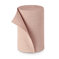 Un rouleau de tissu PütterFlex texturé, de couleur marron clair, fabriqué par Paul Hartmann AG, posé debout, dont l'extrémité est légèrement déroulée, sur un fond blanc.