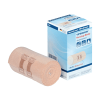 Bande à traction courte Ypsidur® avec pinces de fixation de la société Holthaus Medical GmbH & Co. KG. La photo montre une bande à traction courte à élasticité permanente enroulée, à côté de son emballage. La bande de couleur beige est fixée à l'aide de deux pinces de fixation beiges, et le texte figurant sur l'emballage est principalement rédigé en allemand et contient des informations sur le produit.