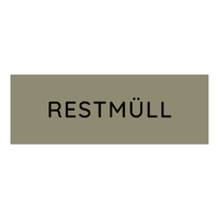 Un panneau rectangulaire gris portant l'inscription « RESTMÜLL » en noir désigne les déchets ménagers et permet de les distinguer des objets munis de la petite étiquette colorée Novocal pour le tri sélectif, portant la mention « Biomüll (marron) », utilisée pour les déchets organiques dans le cadre du tri sélectif.