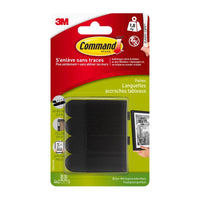 Un paquet de bandes adhésives Command™ de 3M Deutschland GmbH, format S, petites, noires (17202BLK), permettant d'accrocher des tableaux sans clous, pouvant supporter jusqu'à 1,8 kg ; l'emballage, rédigé en allemand et en français, présente un exemple de cadre photo accroché au mur.
