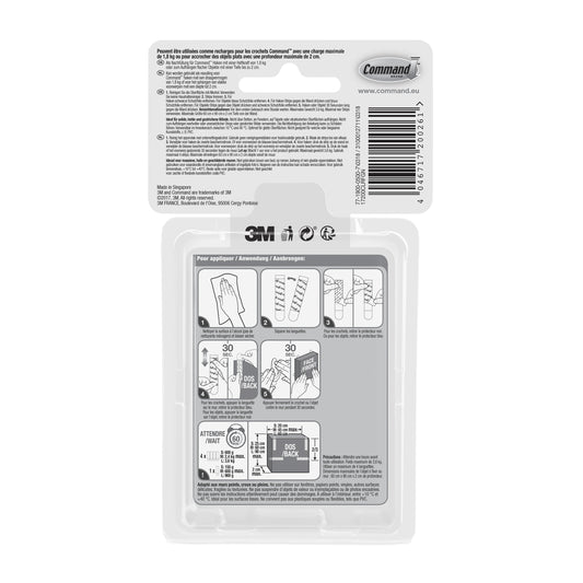Rückansicht einer 3M Deutschland GmbH Multipack Command™ Strips (transparent 17200CLR, 1 Stück) Verpackung mit Gebrauchsanweisung, Sicherheitswarnungen, Strichcode und Branding in Englisch und Französisch auf einer durchsichtigen Verpackung mit schwarzem und weißem Text und Abbildungen.