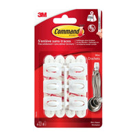 Le lot de mini-crochets Command™, référence 17006, de 3M Deutschland GmbH comprend six crochets blancs munis de bandes adhésives permettant une fixation sans perçage et sans endommager les surfaces. Ils s'enlèvent sans laisser de traces ; livrés dans un emballage rouge et blanc.