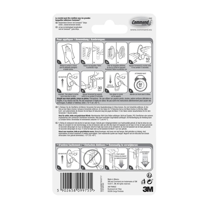 Le dos d'un emballage de crochet à vêtements Command™ 17019-FGN de 3M Deutschland GmbH montre un guide illustré étape par étape pour la fixation murale sans perçage, des avertissements, des détails sur le produit, le code-barres et le logo 3M en noir et blanc.