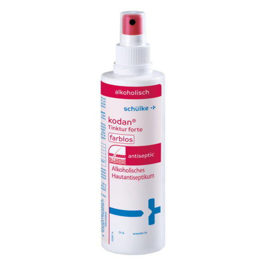 Une bouteille de Schülke kodan® Tinktur forte antiseptique pour la peau, spray antiseptique incolore de Schülke & Mayr GmbH avec une buse de pulvérisation rouge. L'étiquette est en blanc, rose et bleu et montre un texte allemand sur